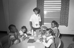 African American children making valentines at the Jake Gaither Recreation Center in Tallahassee.